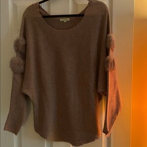 Gorgeous off shoulder sweater with fur accents in sleeves. Totally retro.